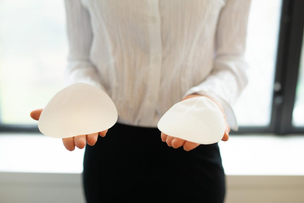 Breast Consultation image of implants in someone's hands